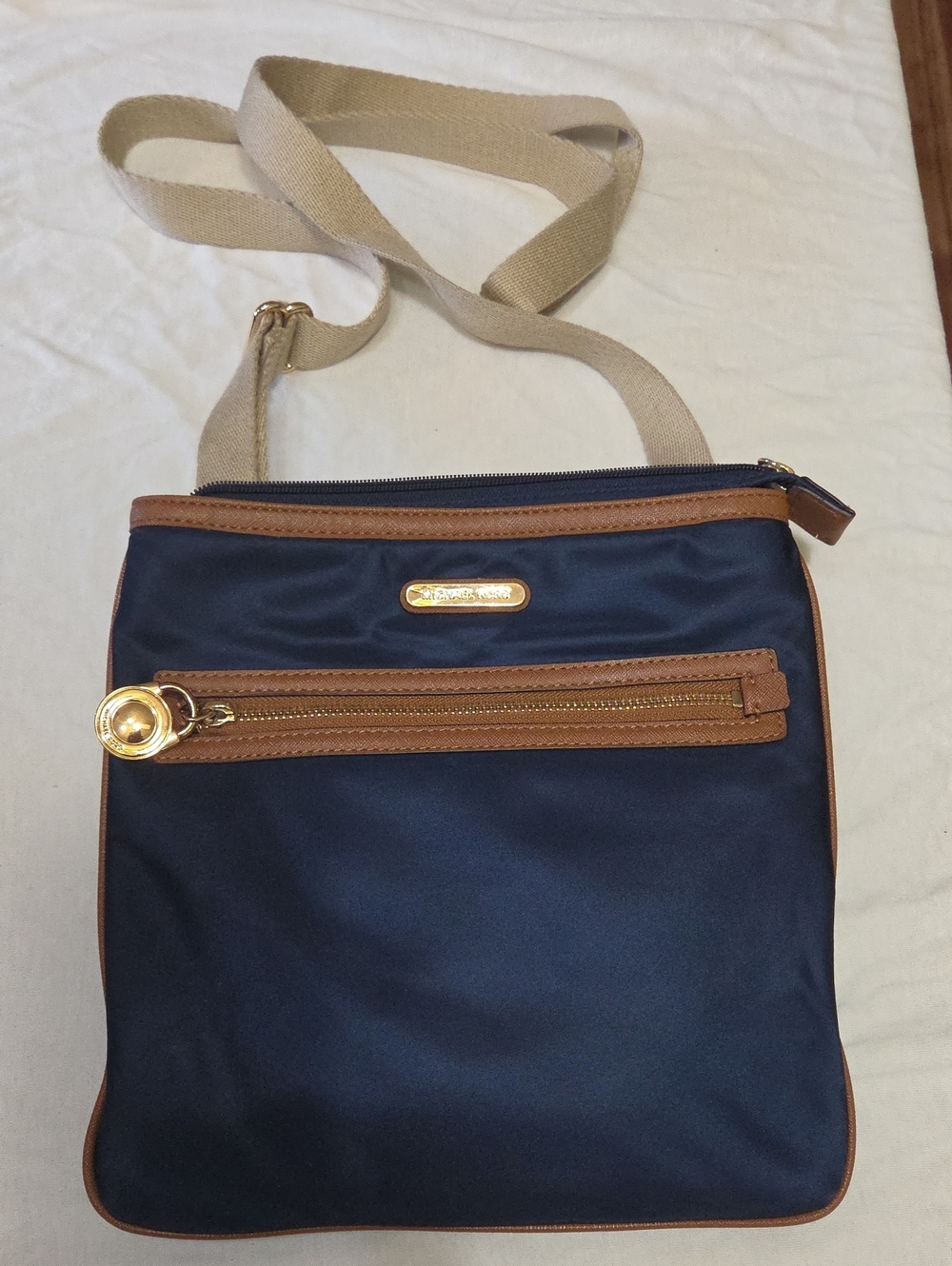 Michael Kors Stylish Navy Crossbody Bag with Tan Trim